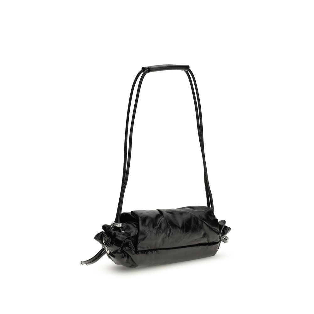 Black Calf Leather Bos Taurus Shoulder BagThe Scrunch-D Shoulder Bag by Diesel is a modern and practical accessory. Featuring two round handles, it offers a front closure with a magnetic flap for easy access to its contents. The brand’s iconic appliquéd l