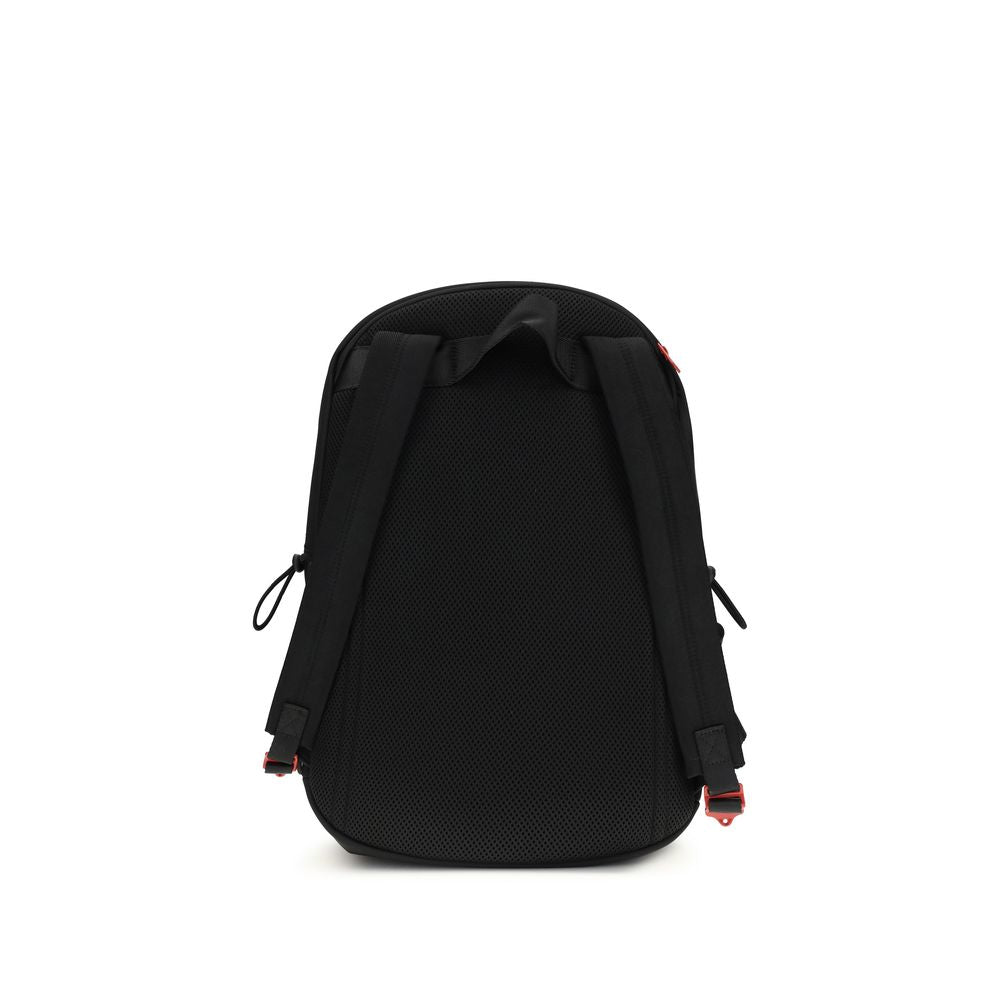 Black Polyester BackpackTech-D Backpack by Diesel is the perfect blend of functionality and urban style. Featuring a zippered top closure and drawstring detail, it offers practicality and security. Adjustable shoulder straps provide customizable comfort,