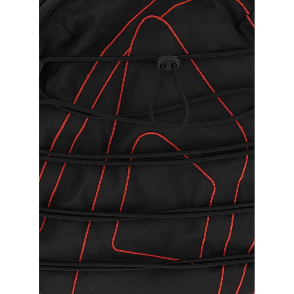 Black Polyester BackpackTech-D Backpack by Diesel is the perfect blend of functionality and urban style. Featuring a zippered top closure and drawstring detail, it offers practicality and security. Adjustable shoulder straps provide customizable comfort,