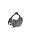 Silver Cotton Shoulder BagThe Grab-D Shoulder Bag by Diesel features a ruched silhouette made of black-wash denim embellished with reflective crystals that add a luminous touch. The belt handle with a hair clip is the distinctive detail that adds personal