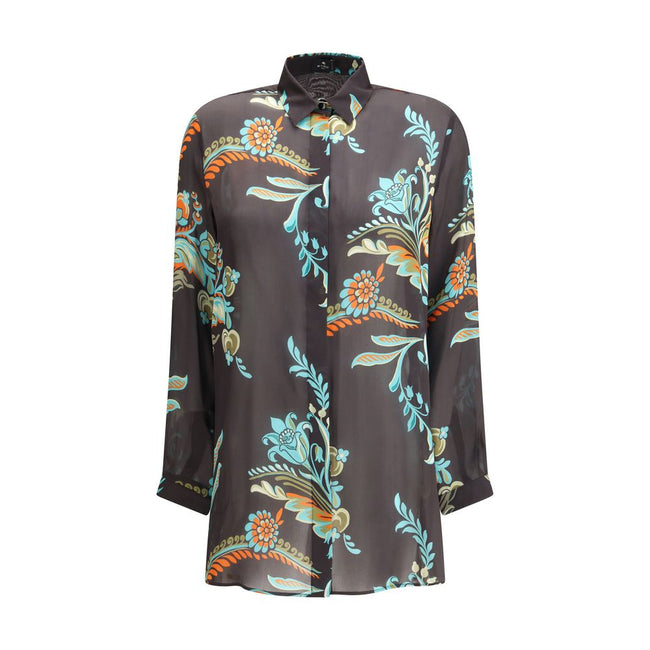 Multicolor Silk Pattern ShirtThe Long Narcissus Print Shirt by Etro is crafted from fine Peau d’Ange silk and features an all-over floral motif that reflects the Maison’s natural elegance and artistic spirit. The shirt showcases a straight, elongated silh