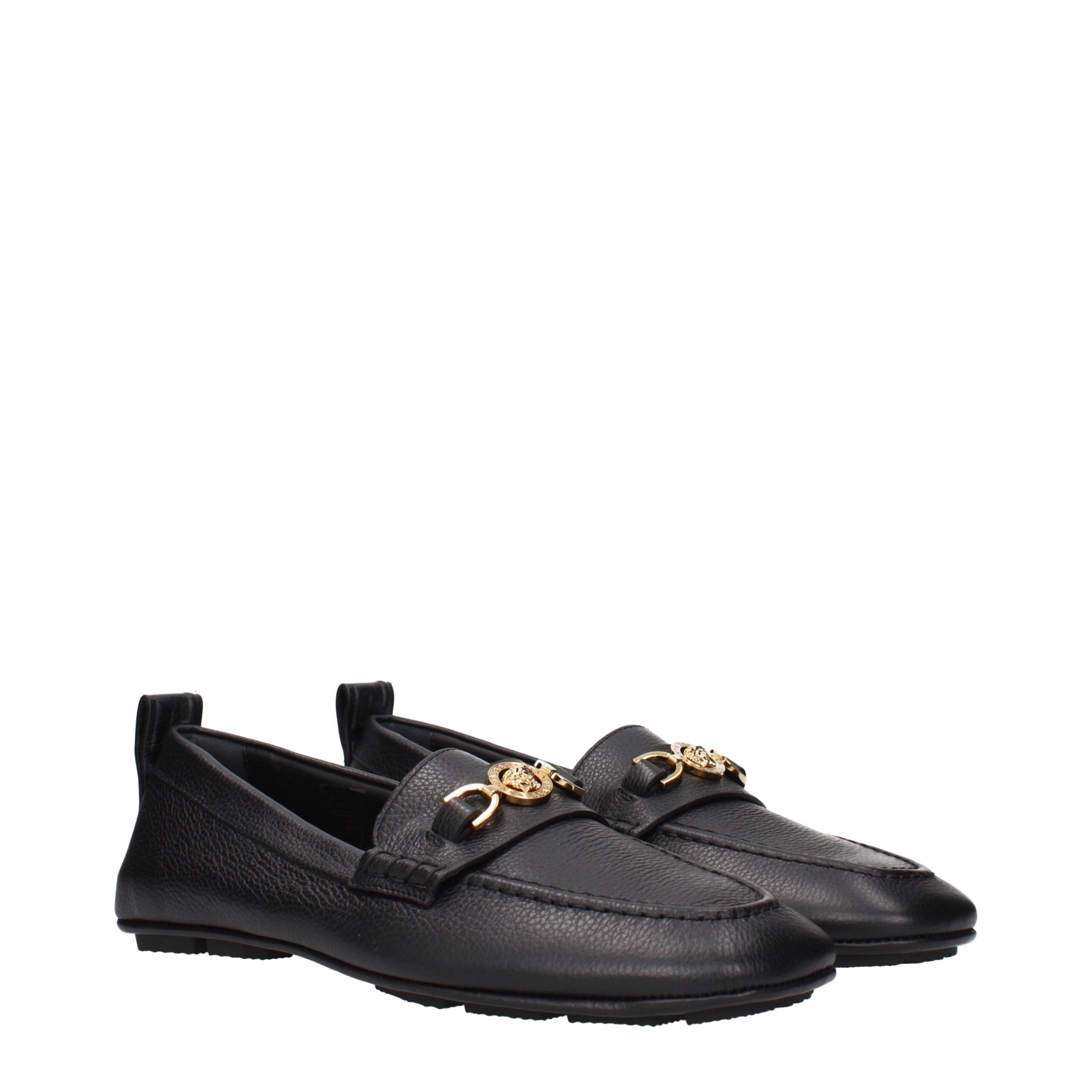 Black Leather Slip-On LoafersDescription: The product with MPN 10170721A121101B00V and code F84524 leather in black is a loafers designed by Versace. It has features like front logo. Additional Info: Style: Casual Shoe sole: Rubber Shoe tip: Round toe Hee