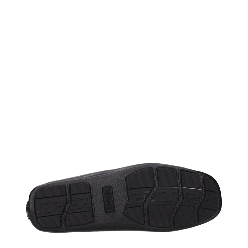 Black Leather Slip-On LoafersDescription: The product with MPN 10170721A121101B00V and code F84524 leather in black is a loafers designed by Versace. It has features like front logo. Additional Info: Style: Casual Shoe sole: Rubber Shoe tip: Round toe Hee
