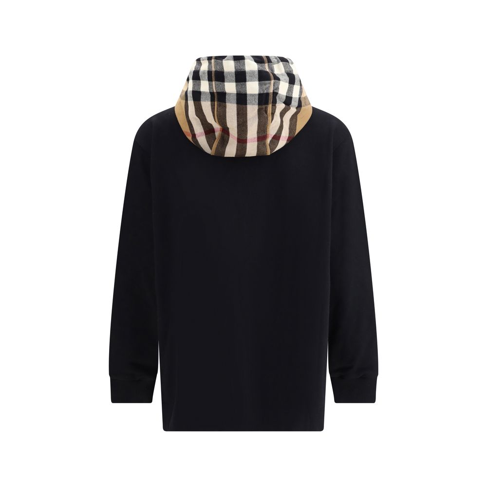 Black Cotton Sweatshirtthe Burberry Cotton Blend Sweatshirt with contrasting Burberry Check hood and calfskin leather details. Featuring a drawstring, kangaroo pockets and ribbed edges, with a relaxed fit for a distinctive casual look. Season: AW22 Fit: O