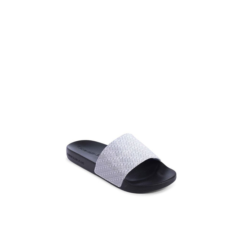 Black Polyurethane SandalsBrand: Calvin Klein Model: YW0YW014030GN Color: Black Composition: 100% Thermoplastic Polyurethane Made in China Designed for Women Material: THERMOPLASTIC POLYURETHANE () Size on Tag: 35Black Polyurethane Sandals${tagsCalvin Kle