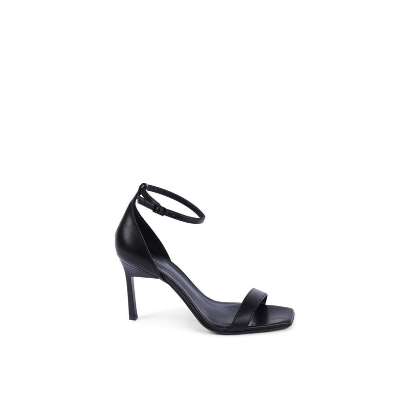 Black Leather Stiletto Heel SandalsBrand: Calvin Klein Model: HW0HW01610BEH Color: Black Composition: 100% Leather (FWA) Made in Italy Gender: Women Material: LEATHER (FWA) () Size on Tag: 38Black Leather Stiletto Heel Sandals${tagsCalvin KleinBlack Leath