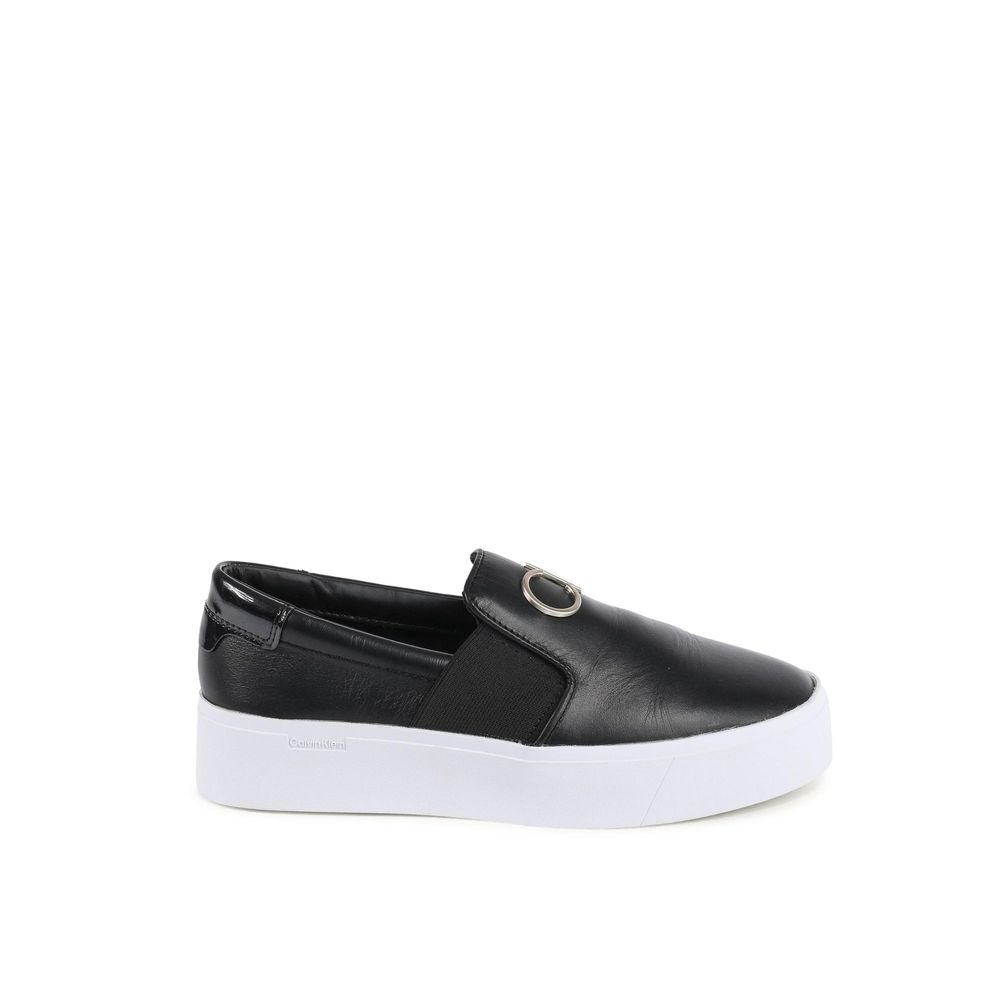 Black Leather Platform SneakersProduct: Calvin Klein Womens Sneaker Black HW0HW01421BEH Brand: Calvin Klein Detail: HW0HW01421BEH Color: Black Composition: 100% Leather Made in China Gender: Women Material: LEATHER (FWA) () Size on Tag: 40Black Leather Pl