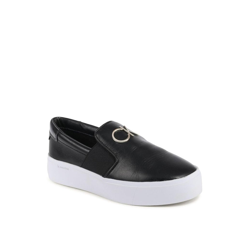 Black Leather Platform SneakersProduct: Calvin Klein Womens Sneaker Black HW0HW01421BEH Brand: Calvin Klein Detail: HW0HW01421BEH Color: Black Composition: 100% Leather Made in China Gender: Women Material: LEATHER (FWA) () Size on Tag: 40Black Leather Pl