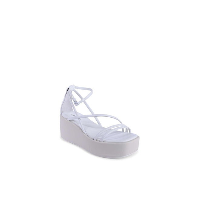 White Leather Platform SandalsBrand: Calvin Klein Model: HW0HW019490K9 Color: White Composition: 100% Leather Made in China Gender: Women Material: LEATHER (FWA) () Size on Tag: 36White Leather Platform Sandals${tagsCalvin KleinWhite Leather Platform Sand
