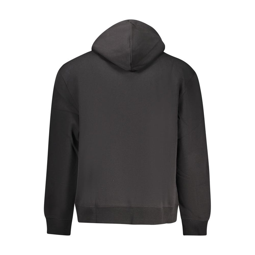 Black Cotton Men SweaterExperience the epitome of urban chic with Calvin Klein’s sleek hooded sweatshirt. Tailored for the fashion-conscious, this statement piece boasts intricate embroidery and applique, infusing your wardrobe with the brand’s iconic log