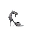 Gray Calfskin Stiletto Heel SandalsDescription: – Composition: 100% calf leather – Inner: Leather – Insole: Leather – Sole: Leather – Round toe – Adjustable ankle buckle closure – Heel 11 cm – Decorative studs – Made in Italy – Gender: WOMEN –Gray Calfski