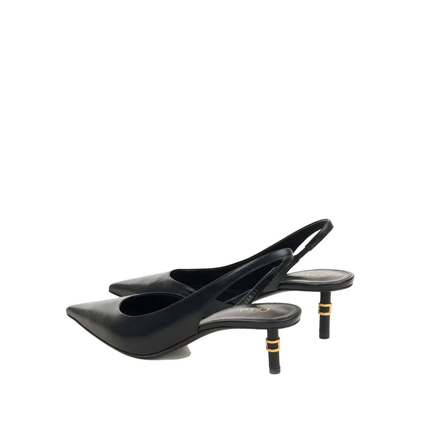 Black Leather High Heel PumpsDescription: – Composition: 100% Leather – Inner: 100% Leather – Insole: 100% Leather – Sole: 100% Leather – Pointed toe – Elasticated side inserts – Heel embellished with Marcie’s miniature hardware – Heel height: 5 cm – Made