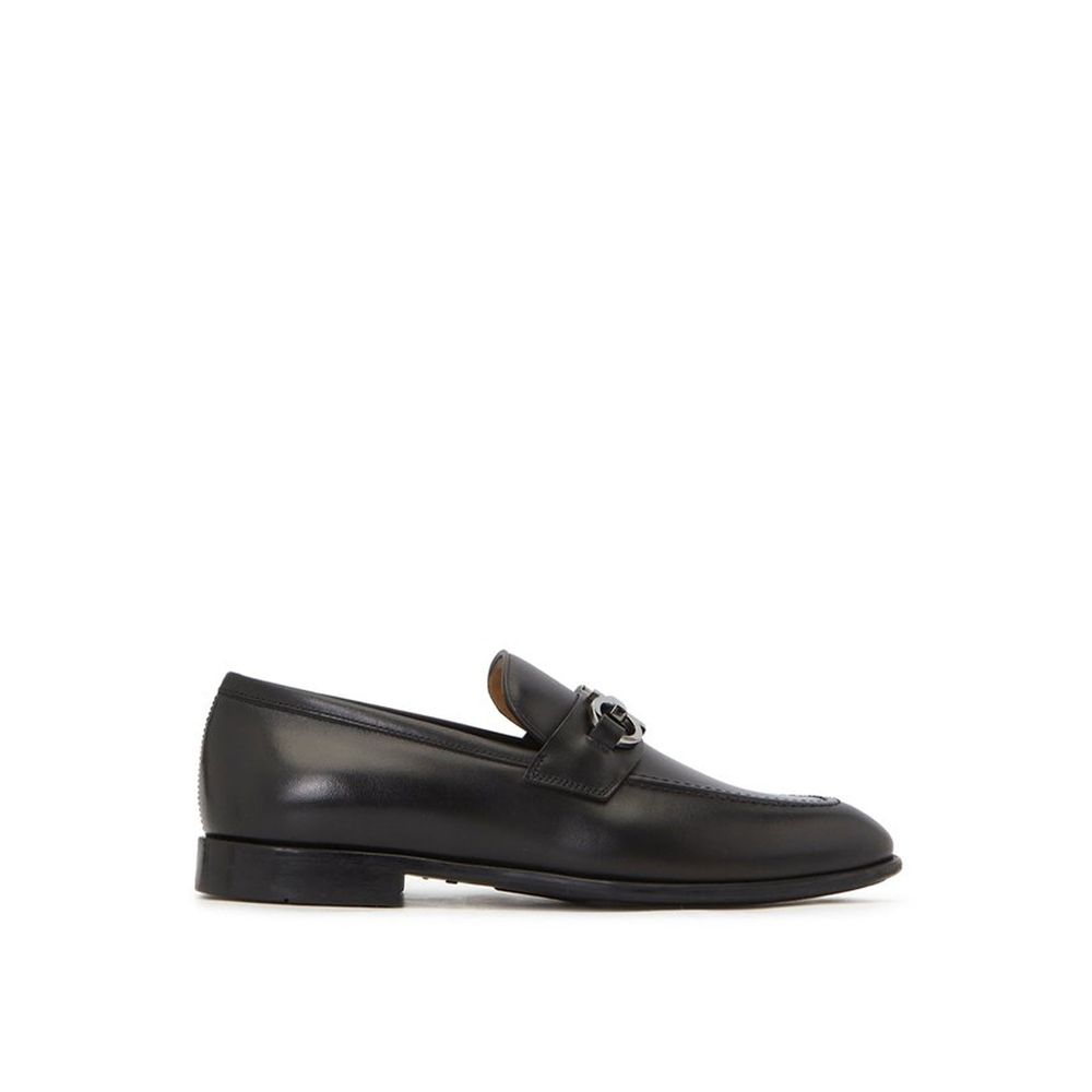 Black Calfskin Slip-On LoafersDescription: – Composition: 100% calf leather – Inner: Leather – Insole: Leather – Sole: Rubber – Round toe – Branded insole – Slip-on design – Top logo hardware – Made in Italy – Gender: MEN –Black Calfskin Slip-On Loafers${
