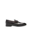 Black Calfskin Slip-On LoafersDescription: – Composition: 100% calf leather – Inner: Leather – Insole: Leather – Sole: Rubber – Branded insole – Almond toe – Top logo hardware – Low stacked heel – Made in Italy – Gender: MEN – Size & Fit: This piece fits