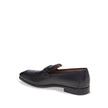 Black Calfskin Slip-On LoafersDescription: – Composition: 100% calf leather – Inner: Leather – Insole: Leather – Sole: Rubber – Branded insole – Almond toe – Top logo hardware – Low stacked heel – Made in Italy – Gender: MEN – Size & Fit: This piece fits