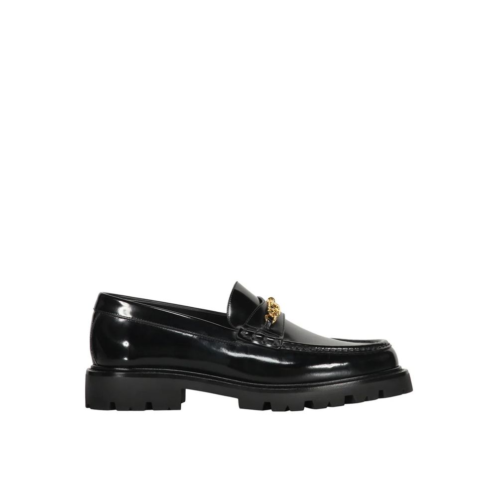 Black Calfskin Slip-On LoafersDescription: – Composition: 100% calf leather – Inner: Leather – Insole: Leather – Sole: Rubber – Round toe – Branded insole – Slip-on design – Gold-tone front logo detail – Smooth leather item – Made in Italy – Gender: MEN –