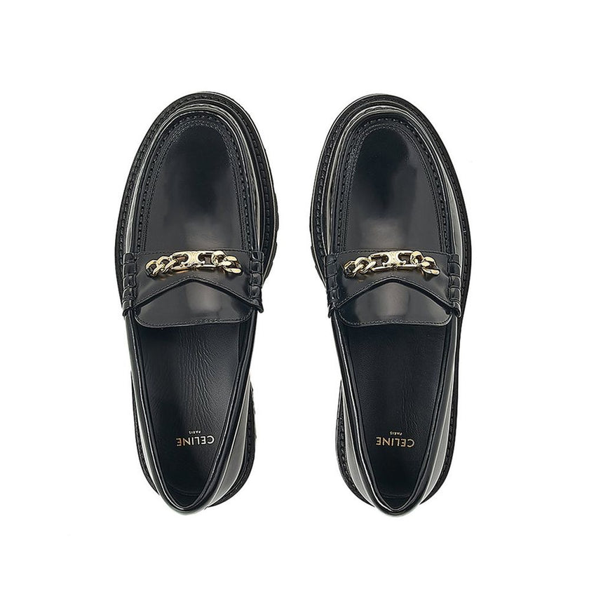 Black Calfskin Slip-On LoafersDescription: – Composition: 100% calf leather – Inner: Leather – Insole: Leather – Sole: Rubber – Round toe – Branded insole – Slip-on design – Gold-tone front logo detail – Smooth leather item – Made in Italy – Gender: MEN –