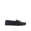 Black Calfskin Slip-On LoafersDescription: – Composition: 100% calf leather – Inner: Leather – Insole: Leather – Sole: Rubber – Round toe – Textured leather – Branded insole – Non-slip knurled sole – Iconic triangular signature brand plaque – Made in Ital