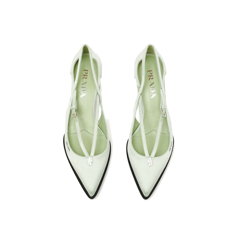 Green Silk Mid Heel PumpsDescription: – Composition: 100% Silk – Inner: Leather – Insole: Leather – Sole: Rubber – Pointed toe – Heel 5,5 cm – Metal buckle closure – Upper with jeweled ornament – Screen-printed logo – Brushed leather-covered heel – Made i