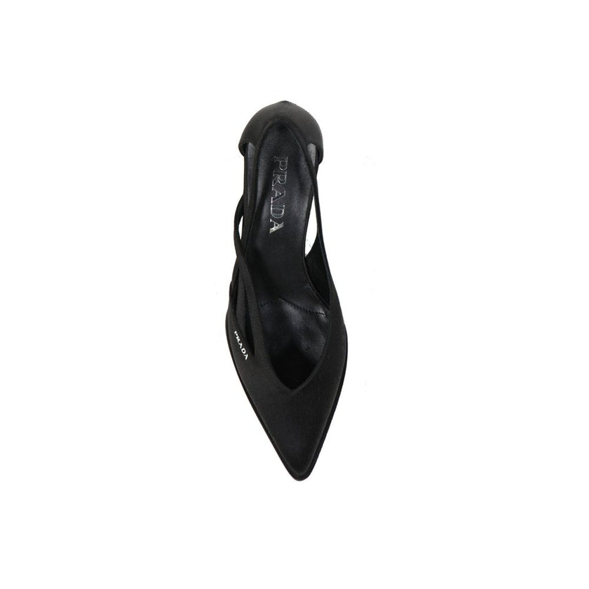 Black Silk Mid Heel PumpsDescription: – Composition: 100% Silk – Inner: Leather – Insole: Leather – Sole: Rubber – Pointed toe – Cut-out detail – Branded insole – Slip-on design – Heel 5,5 cm – Side small logo detail – Made in Italy – Gender: WOMEN –Black
