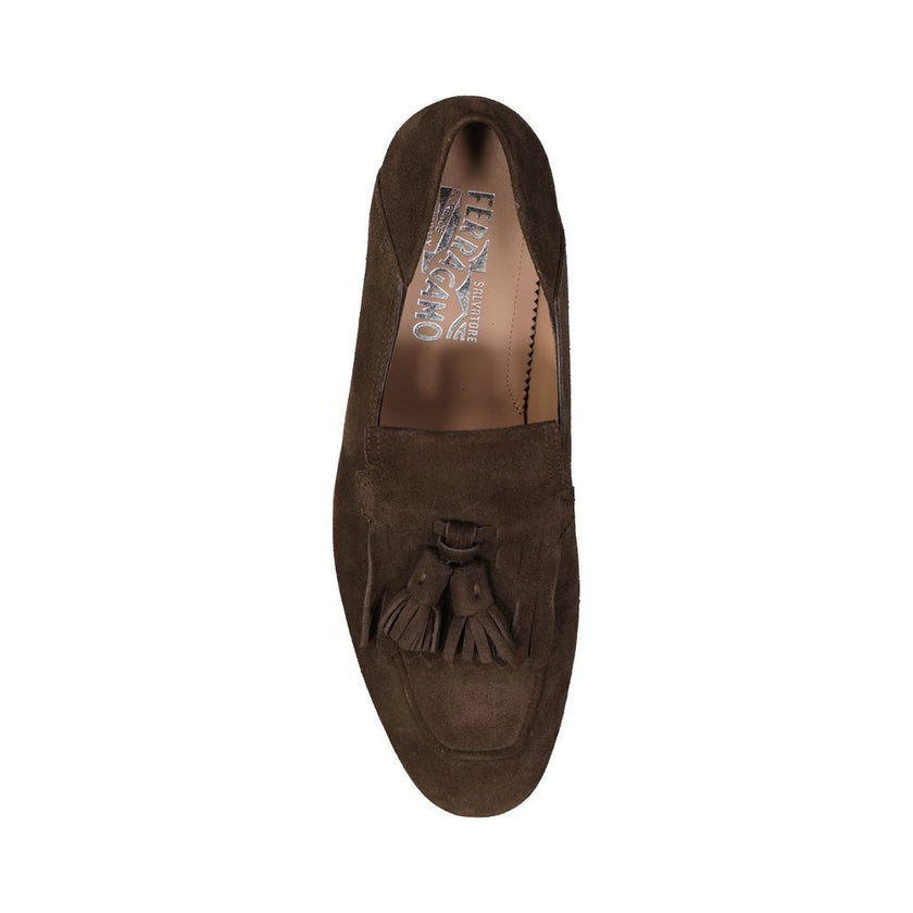 Brown Calfskin Slip-On LoafersDescription: – Composition: 100% calf leather – Inner: Leather – Insole: Leather – Sole: Leather – Round toe – Fringe top details – Suede effect – Made in Italy – Gender: MEN –Brown Calfskin Slip-On Loafers${tagsSalvatore Fer