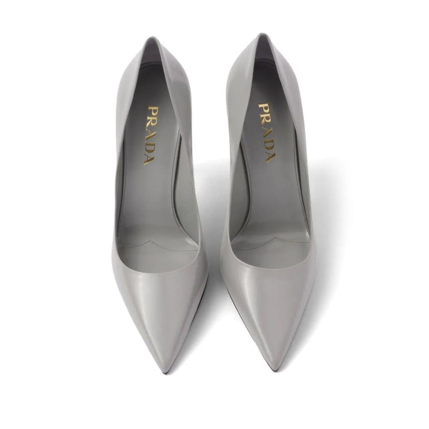Gray Leather High Heel PumpsDescription: – Composition: 100% Leather – Inner: 100% Leather – Insole: 100% Leather – Sole: 100% Leather – Pointed toe – Branded insole – Heel 10 cm – Made in Italy – Gender: WOMEN –Gray Leather High Heel Pumps${tagsPradaGray