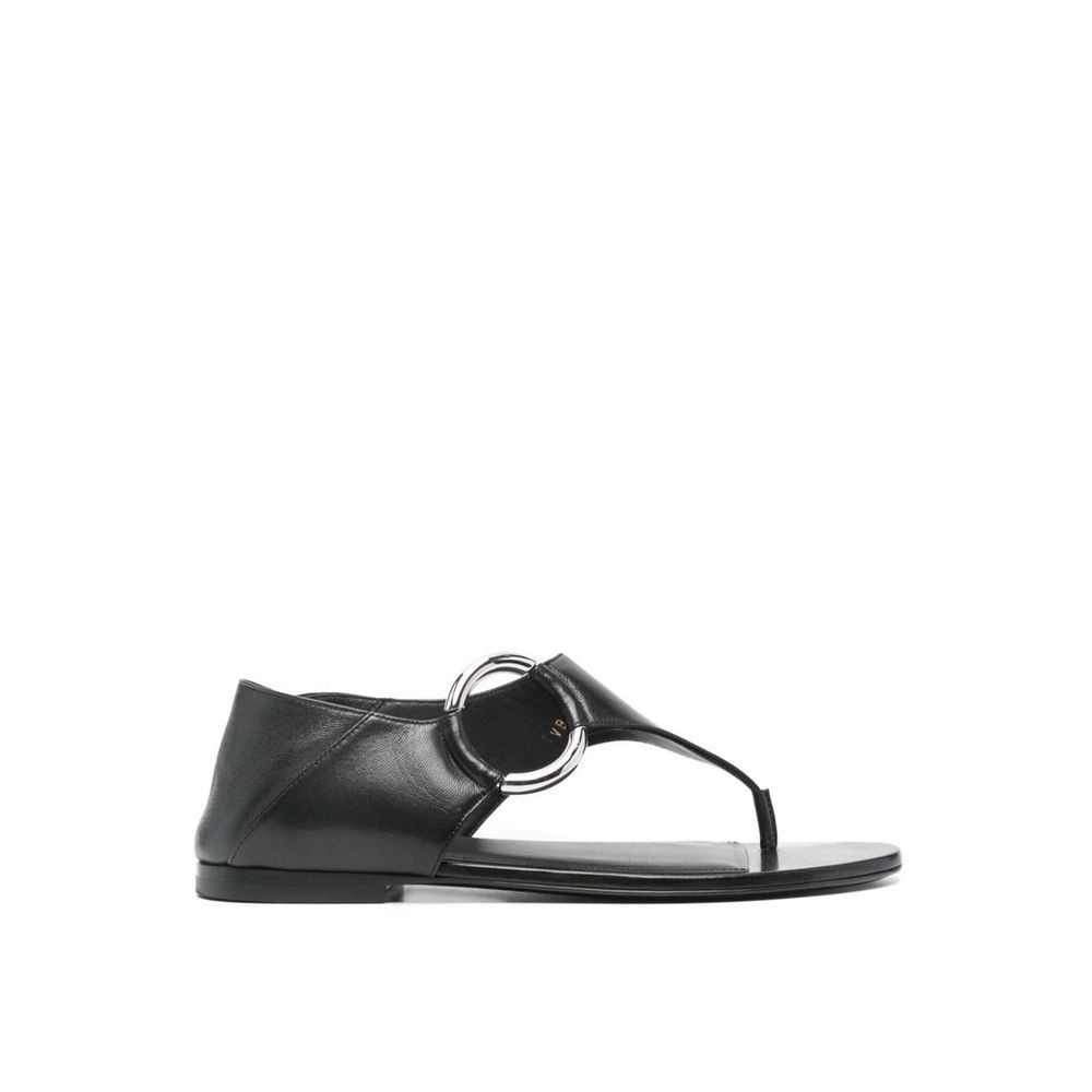 Black Calfskin Strap-On SandalsDescription: – Composition: 100% calf leather – Inner: Leather – Insole: Leather – Sole: Leather – Round toe – Branded insole – Slip-on design – Smooth grain leather – Thong strap – Silver-tone ring hardware detailing – Made
