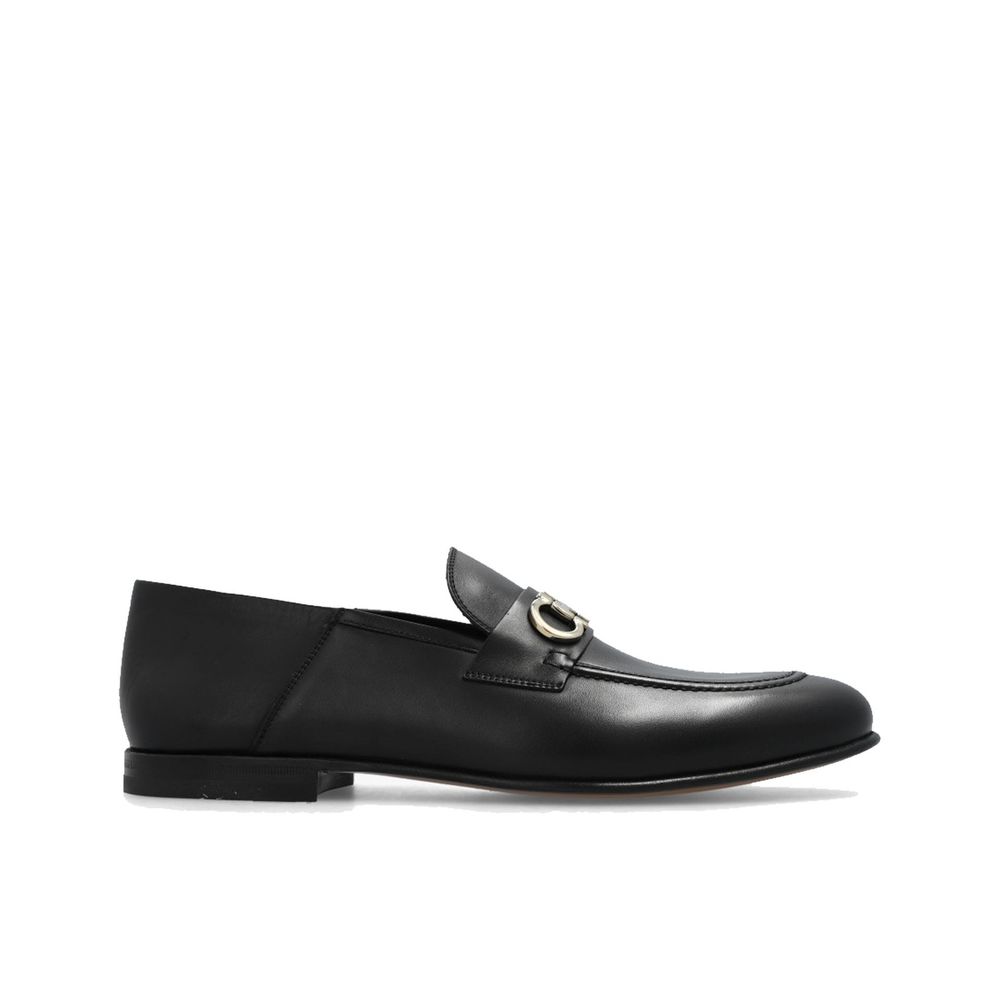Black Calfskin Slip-On LoafersDescription: – Composition: 100% calf leather – Inner: Leather – Insole: Leather – Sole: Leather – Top metal hardware – Almond toe – Made in Italy – Gender: MEN –Black Calfskin Slip-On Loafers${tagsSalvatore FerragamoBlack Ca