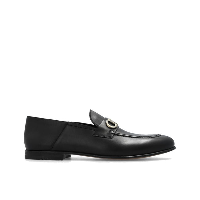 Black Calfskin Slip-On LoafersDescription: – Composition: 100% calf leather – Inner: Leather – Insole: Leather – Sole: Leather – Top metal hardware – Almond toe – Made in Italy – Gender: MEN –Black Calfskin Slip-On Loafers${tagsSalvatore FerragamoBlack Ca