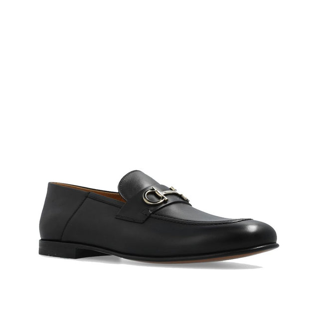 Black Calfskin Slip-On LoafersDescription: – Composition: 100% calf leather – Inner: Leather – Insole: Leather – Sole: Leather – Top metal hardware – Almond toe – Made in Italy – Gender: MEN –Black Calfskin Slip-On Loafers${tagsSalvatore FerragamoBlack Ca