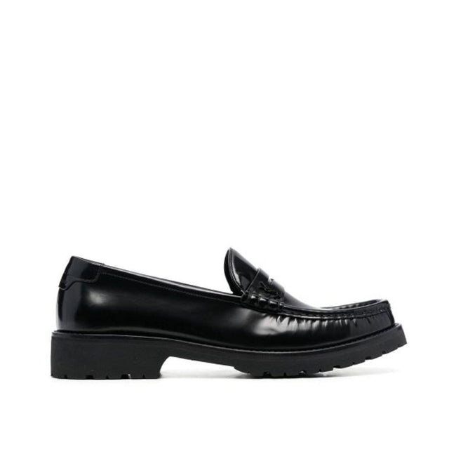Black Calfskin Slip-On LoafersDescription: – Composition: 100% calf leather – Inner: Leather – Insole: Leather – Sole: Rubber – slip on – Round toe – Patent effect – Iconic YSL logo – Made in Italy – Gender: MEN –Black Calfskin Slip-On Loafers${tagsSaint