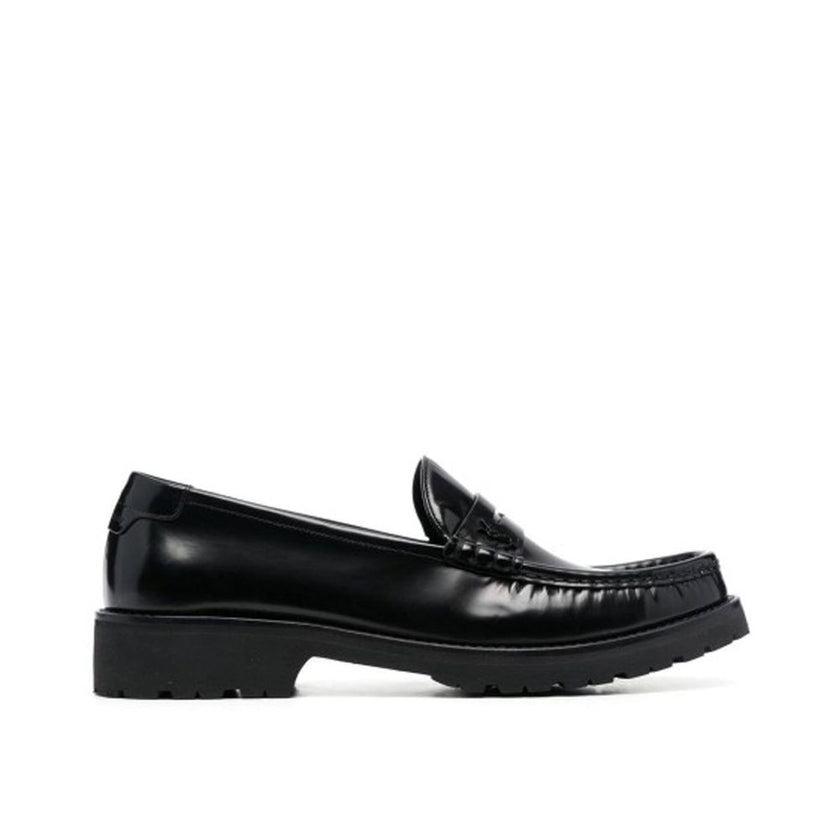 Black Calfskin Slip-On LoafersDescription: – Composition: 100% calf leather – Inner: Leather – Insole: Leather – Sole: Rubber – slip on – Round toe – Patent effect – Iconic YSL logo – Made in Italy – Gender: MEN –Black Calfskin Slip-On Loafers${tagsSaint
