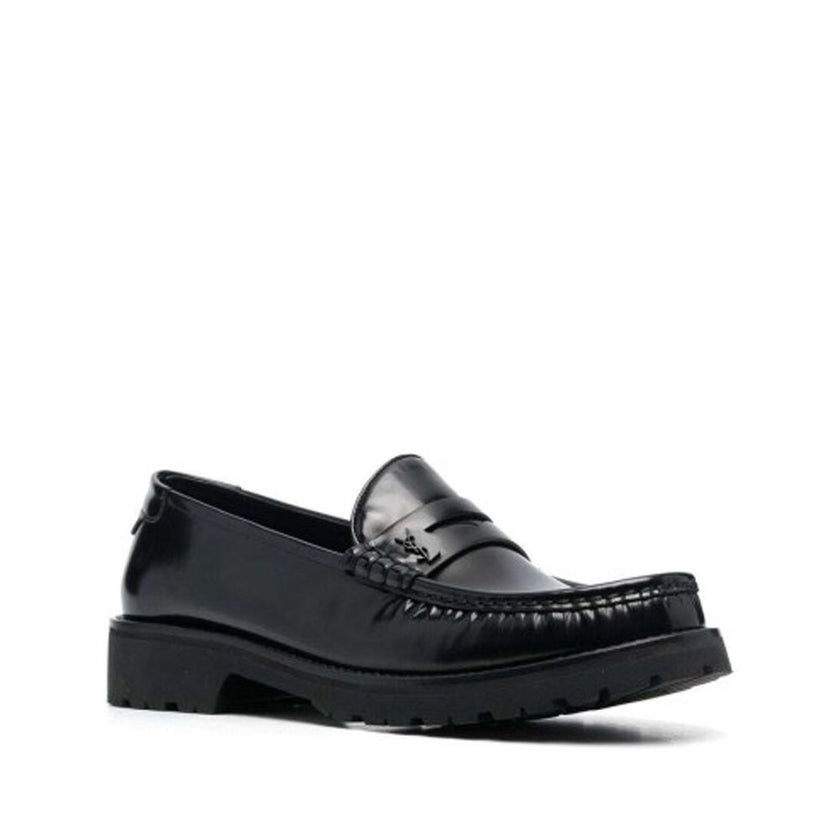 Black Calfskin Slip-On LoafersDescription: – Composition: 100% calf leather – Inner: Leather – Insole: Leather – Sole: Rubber – slip on – Round toe – Patent effect – Iconic YSL logo – Made in Italy – Gender: MEN –Black Calfskin Slip-On Loafers${tagsSaint