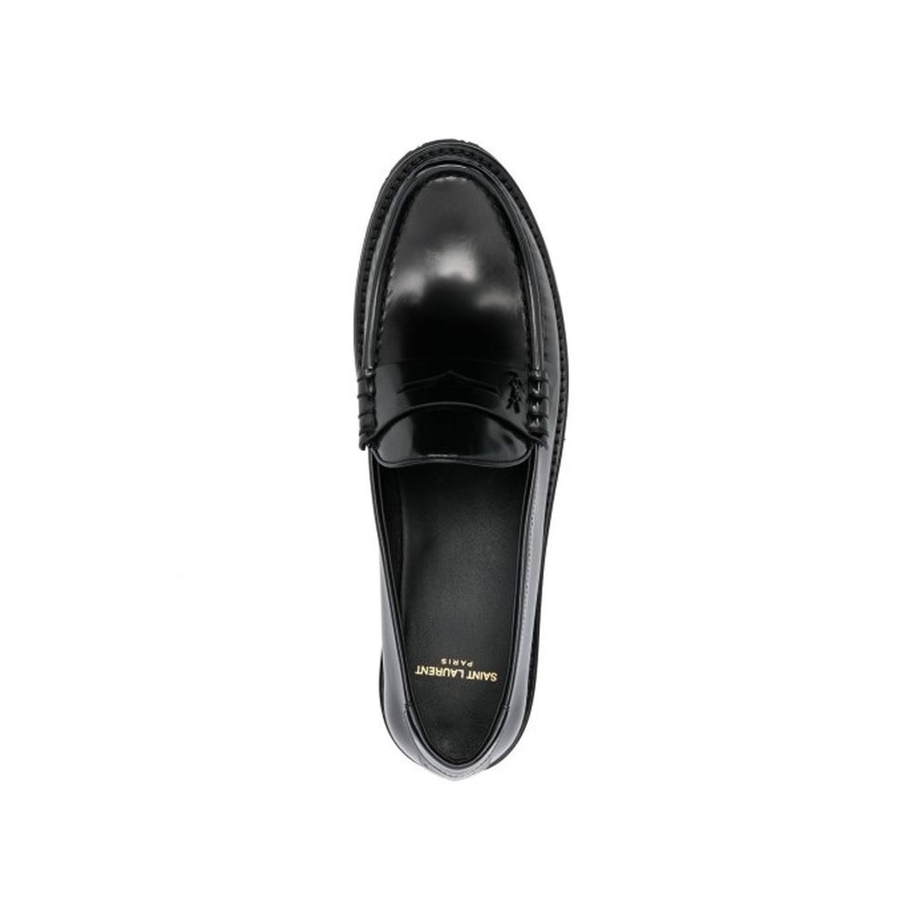 Black Calfskin Slip-On LoafersDescription: – Composition: 100% calf leather – Inner: Leather – Insole: Leather – Sole: Rubber – slip on – Round toe – Patent effect – Iconic YSL logo – Made in Italy – Gender: MEN –Black Calfskin Slip-On Loafers${tagsSaint
