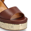 Brown Calfskin Platform SandalsDescription: – Composition: 100% calf leather – Inner: Leather – Insole: Leather – Sole: Leather – Heel: 10.0 cm / 25.4 in – Platform: 4.0 cm / 10.16 in – round toe – Logo ankle buckle closure – patent side detail – Gender: