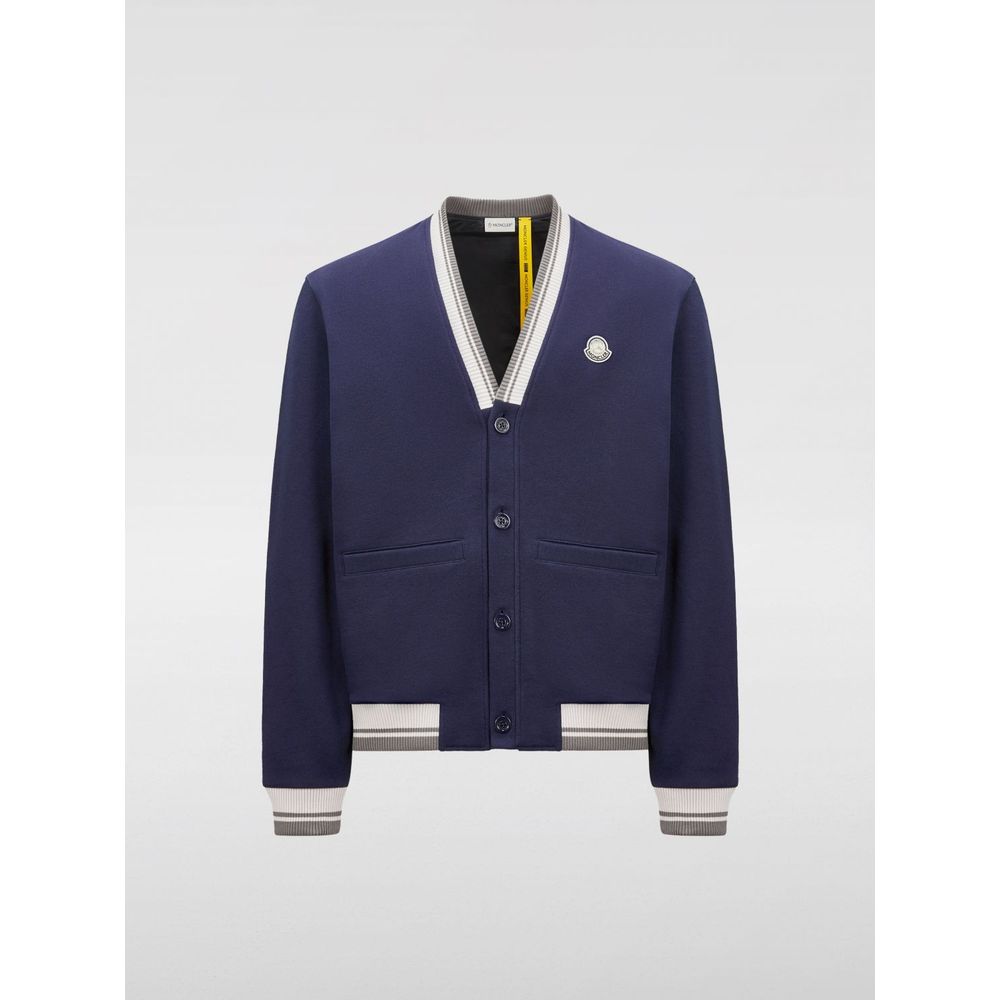 Blue Cotton BomberDesigned for men Made by Moncler Blue color Ideal for casual wear Great for layering Material: Cotton blend ribbed trims Size on Tag: LBlue Cotton Bomber${tagsMonclerBlue Cotton BomberDesigned for men Made by Moncler Blue color Ideal for