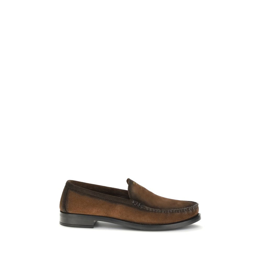Brown Leather Slip-On LoafersThe Loafers by Prada crafted from vintage-effect suede leather, featuring a laminated logo printed on the vamp. Designed with a rounded toe and an internal printed logo, they express a timeless and elegant aesthetic. Season: A