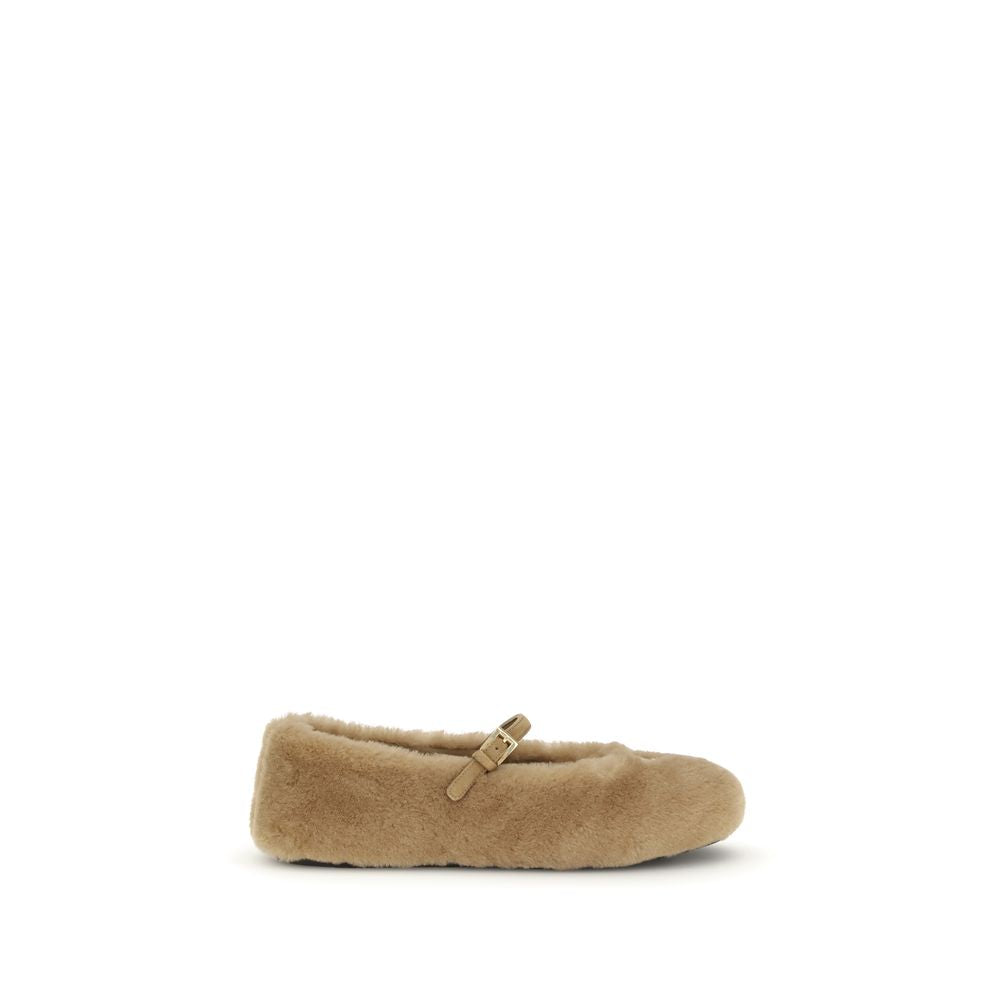 Beige Lamb Ovis Aries Aries Ballet FlatsThe lambskin Ballerinas by Prada reinterpret feminine footwear with soft volumes and winter textures that combine comfort and elegance. Made of sheepskin, they feature an upper with a leather strap and logo buckle a