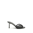 Black Calf Leather Bos Taurus Stiletto Heel SandalsThe mesh slipper Sandals by Prada combine lightness and contemporary style in a sophisticated design. The mesh strap is accented by the iconic triangular leather logo plaque, while the stiletto heel lends