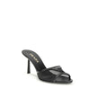 Black Calf Leather Bos Taurus Stiletto Heel SandalsThe mesh slipper Sandals by Prada combine lightness and contemporary style in a sophisticated design. The mesh strap is accented by the iconic triangular leather logo plaque, while the stiletto heel lends