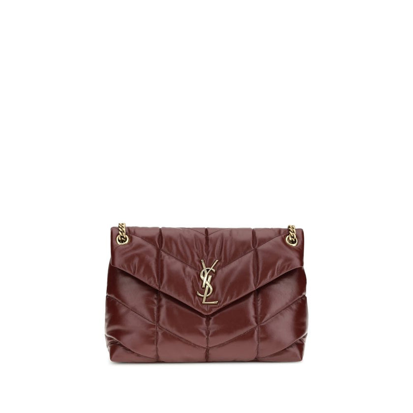 Bordeaux Calf Leather Bos Taurus Shoulder BagThe medium Puffer Bag in glossy leather by Yves Saint Laurent reimagines the iconic Loulou with a contemporary, sensual twist. Crafted from shiny leather with chevron-quilted stitching, it combines softness and