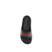 Black Rubber SlippersThe rubber Slippers by Gucci are part of the Gucci Lido line and reinterpret one of the Maison’s most iconic symbols in a pop twist: the green and red Web ribbon. Made of black rubber and featuring a slip-on design, they combine comfo