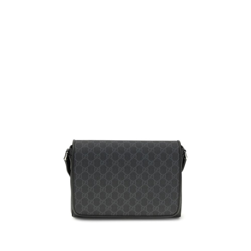 Black Polyethylene Shoulder BagThe Medium GG crossbody Bag by Gucci, an iconic accessory that combines tradition and modernity. Crafted from the signature GG Supreme canvas, a timeless symbol of the Maison, it stands out for its softness and flexibility,