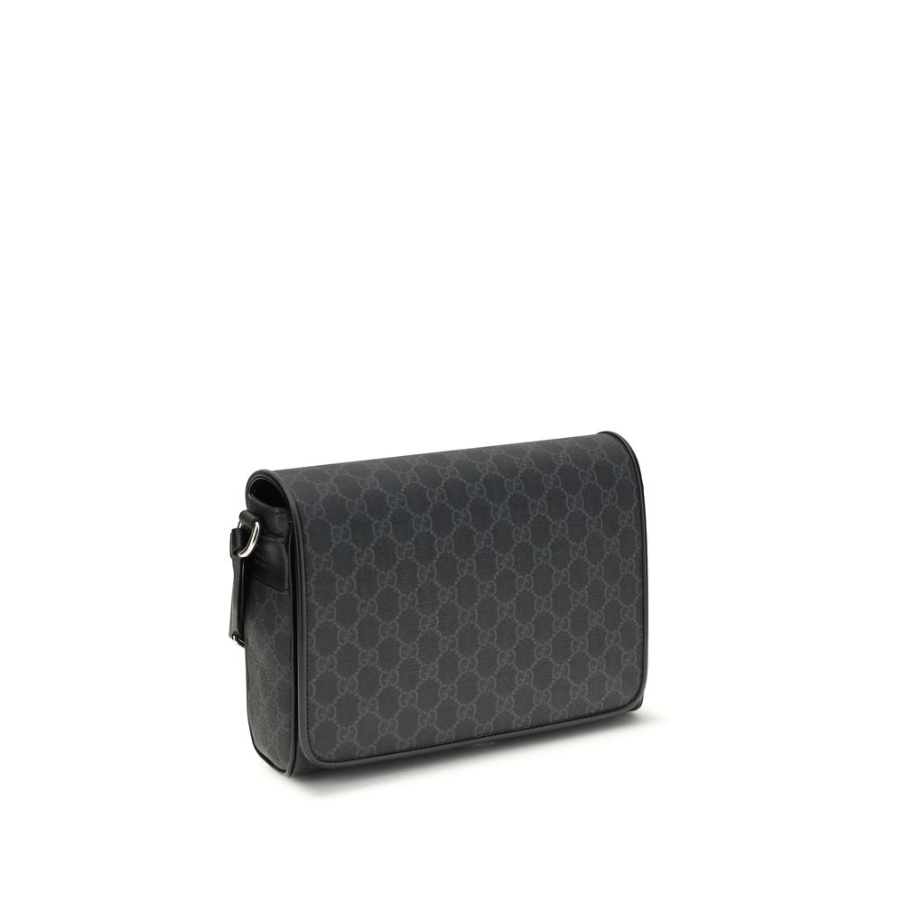 Black Polyethylene Shoulder BagThe Medium GG crossbody Bag by Gucci, an iconic accessory that combines tradition and modernity. Crafted from the signature GG Supreme canvas, a timeless symbol of the Maison, it stands out for its softness and flexibility,