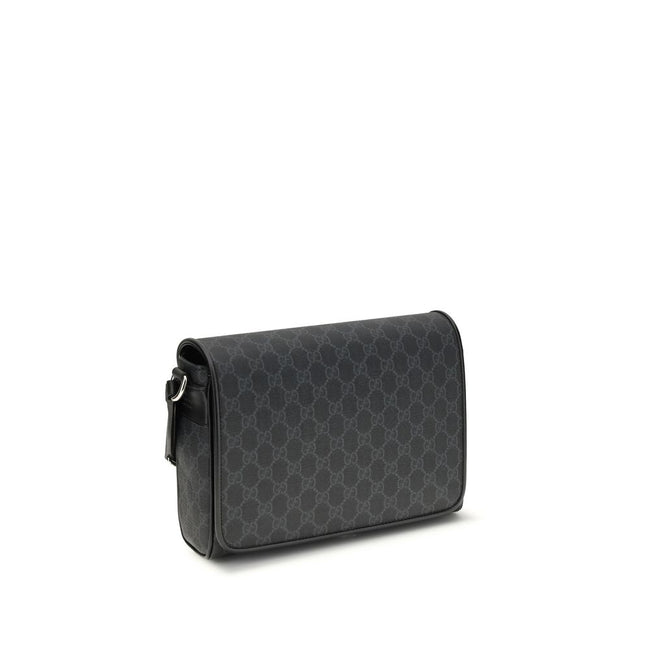 Black Polyethylene Shoulder BagThe Medium GG crossbody Bag by Gucci, an iconic accessory that combines tradition and modernity. Crafted from the signature GG Supreme canvas, a timeless symbol of the Maison, it stands out for its softness and flexibility,