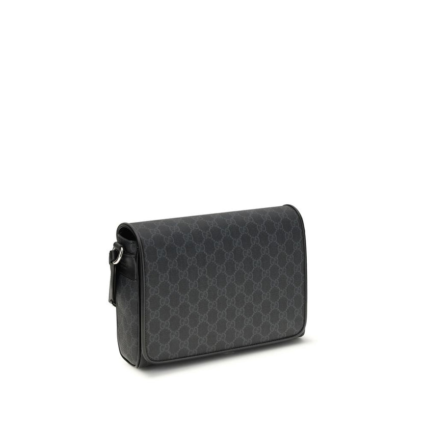 Black Polyethylene Shoulder BagThe Medium GG crossbody Bag by Gucci, an iconic accessory that combines tradition and modernity. Crafted from the signature GG Supreme canvas, a timeless symbol of the Maison, it stands out for its softness and flexibility,