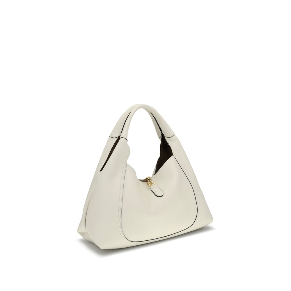 White Calf Leather Bos Taurus Shoulder BagThe Softbit maxi Shoulder Bag by Gucci is an imposing and elegant accessory, ideal for those seeking space and style. Crafted in refined black grained leather, it offers rich texture and lasting strength. Gold-ton