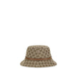 Beige Polyester Bucket HatThe GG Supreme fabric Bucket Hat by Gucci combines style and functionality in a distinctive accessory. Made of GG fabric, it is enhanced by a leather strap with GG detail and completed with an inner lining, for a model that combi