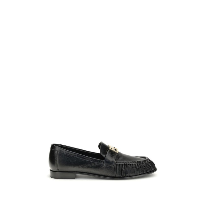 Black Calf Leather Bos Taurus Slip-On LoafersThe nappa Baguette Loafers by Fendi are a perfect example of timeless elegance and Italian craftsmanship. Crafted from soft nappa leather, they’re embellished with the iconic FF metal detail on the vamp, the Ma