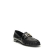 Black Calf Leather Bos Taurus Slip-On LoafersThe nappa Baguette Loafers by Fendi are a perfect example of timeless elegance and Italian craftsmanship. Crafted from soft nappa leather, they’re embellished with the iconic FF metal detail on the vamp, the Ma